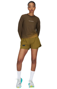 Women's running shorts in Gold Olive, featuring an inner lining and side vents. The 3-inch Flow Shorts offer a soft stretch and are made from ECONYL®. Podium Logo on the front and a reflective "Finish in a Good Place" slogan on the back. Includes one pocket in the inner lining and a hidden pocket at the back. Also available in a 5-inch length.