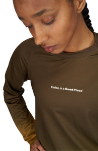 Women's long sleeve Running T-Shirt in Brown/Golden with raglan sleeves. It features a gradient sublimation print shifting to a lighter shade at the bottom. Made from quick-drying, post-consumer recycled polyester with 4-way stretch for great flexibility, ventilation, and breathability. The UNNA "Finish in a Good Place" manifesto is printed on the chest.