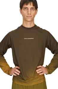 Men's long sleeve Running T-Shirt in Brown/Golden with raglan sleeves. It features a gradient sublimation print shifting to a lighter shade at the bottom. Made from quick-drying, post-consumer recycled polyester with 4-way stretch for great flexibility, ventilation, and breathability. The UNNA "Finish in a Good Place" manifesto is printed on the chest.