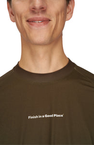 Men's long sleeve Running T-Shirt in Brown/Golden with raglan sleeves. It features a gradient sublimation print shifting to a lighter shade at the bottom. Made from quick-drying, post-consumer recycled polyester with 4-way stretch for great flexibility, ventilation, and breathability. The UNNA "Finish in a Good Place" manifesto is printed on the chest.