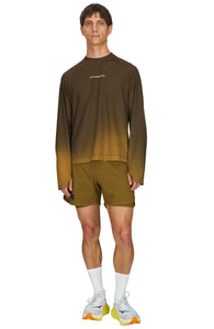 Men's long sleeve Running T-Shirt in Brown/Golden with raglan sleeves. It features a gradient sublimation print shifting to a lighter shade at the bottom. Made from quick-drying, post-consumer recycled polyester with 4-way stretch for great flexibility, ventilation, and breathability. The UNNA "Finish in a Good Place" manifesto is printed on the chest.