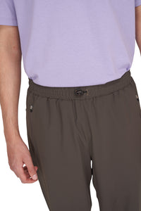 Men's straight running pants in wren green with a soft stretch and elastic waist.